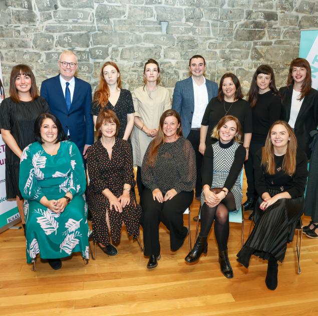 The AONTAS team standing together at a recent event
